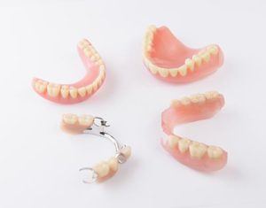 pairs of both partial dentures and full dentures