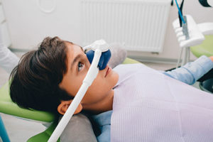 child having a procedure done by a houston sedation dentist