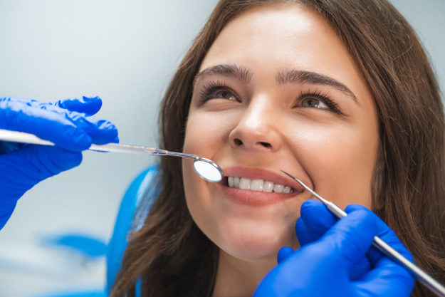 The Ease of Saturday Dental Appointments woman visiting a saturday dentist