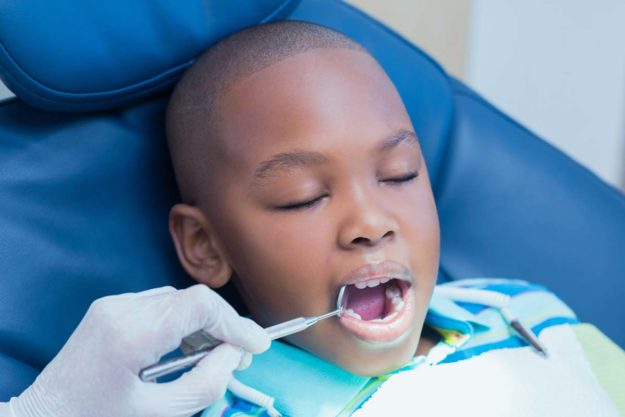 pediatric-dental-emergencies child getting treatment for a pediatric dental emergency