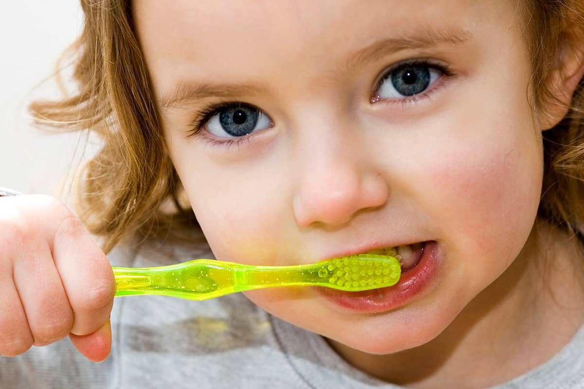 oral health (1) small child brushing teeth for oral health