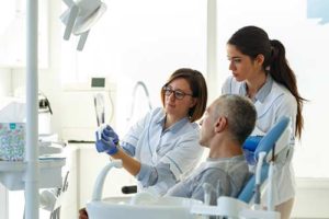 a man visits an emergency dentist