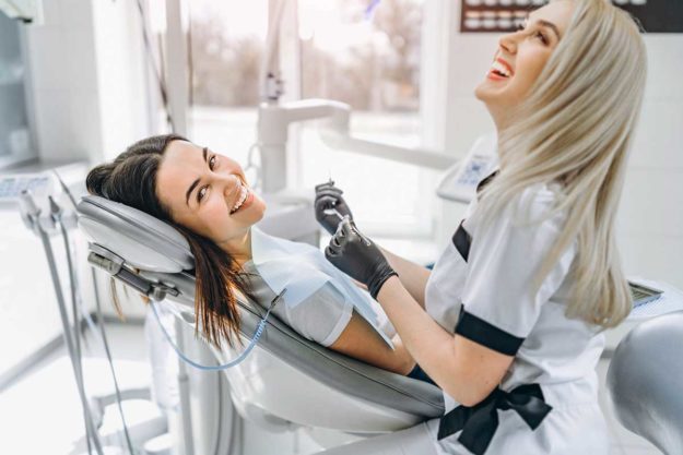 1-3-Benefits-of-Adult-Orthodontic-Services- (1) woman benefitting from adult orthodontics