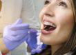 woman getting dental braces